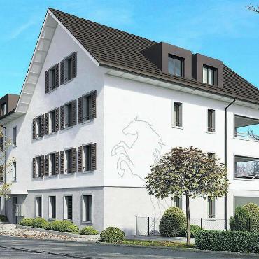 Baugrube verschwindet bald - Die Visualisierung zeigt, wie das Gebäude an der Stelle des ehemaligen Restaurants Rössli aussehen wird. Visualisierung: zg