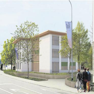Ohne Wenn und Aber - Die Visualisierung zeigt, wie sich das neue Schulhaus dereinst in das Dorfbild integrieren soll. Bild: zg