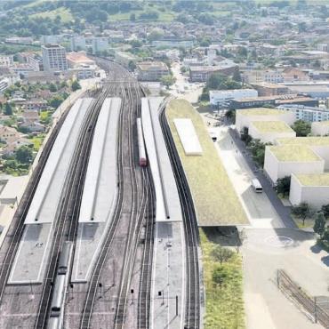 Mehr als ein Umsteigeort - Beim Grossprojekt Bahnhof Lenzburg geht es nicht nur um Gleise und Perrons, mitten in der Stadt soll ein ganz neues Quartier entstehen samt Gewerbeflächen und Begegnungsorten. Visualisierung: SBB