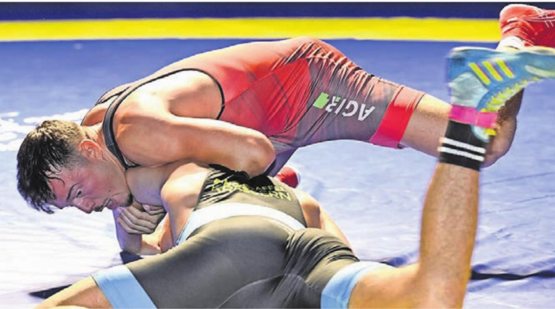 Michael Bucher (oben) war einer der Ringer, die den Freiämter Sieg im Hinkampf gegen Kriessern sicherten. Gelingt das auch morgen Samstag? Bild: Archiv/awa - Das Bild wird blockiert. – Möglicherweise durch einen aktiven Adblocker.